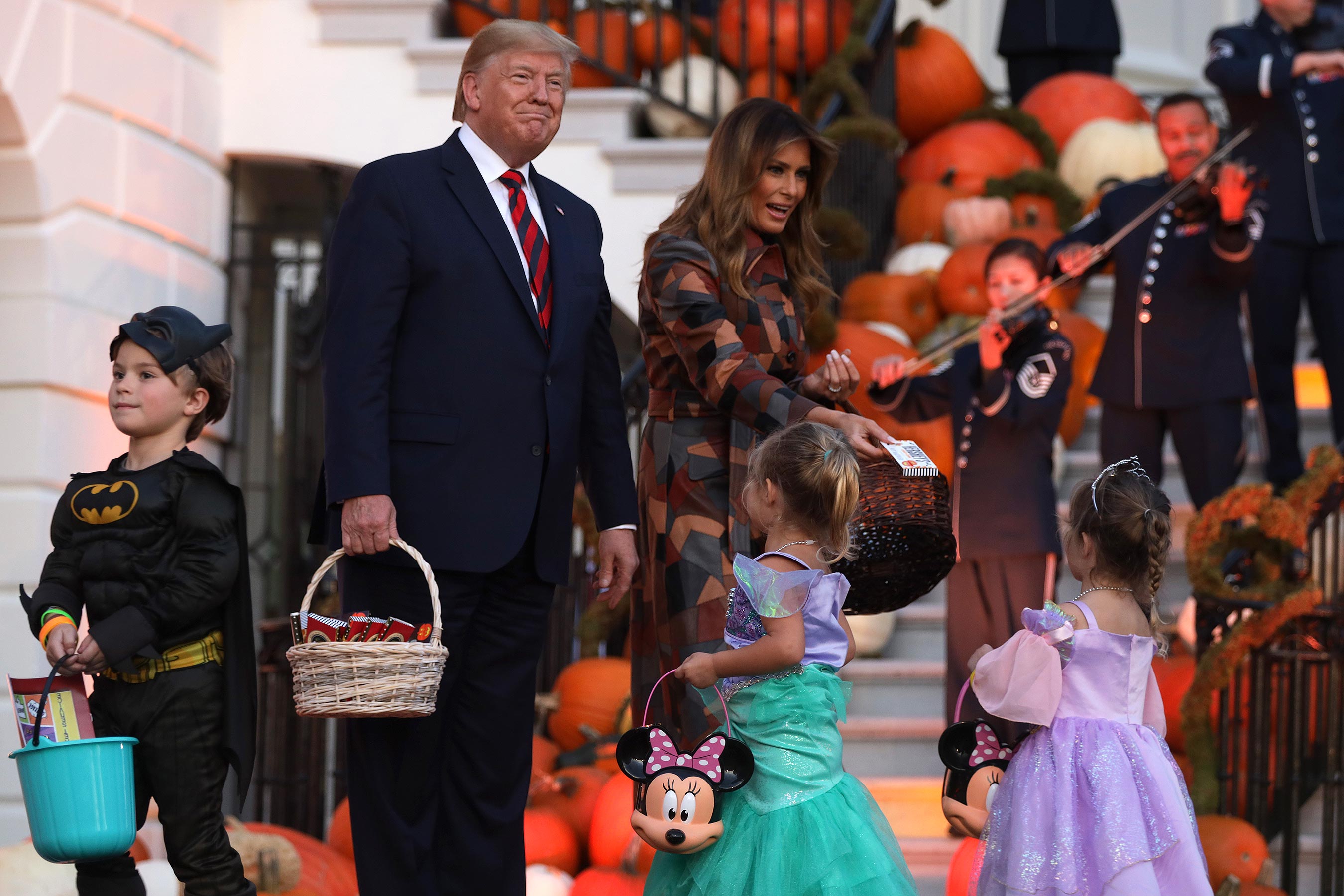 Donald and Melania Trump Pass Out Halloween Candy — Including a Viral Moment with a Kid in Minion Costume