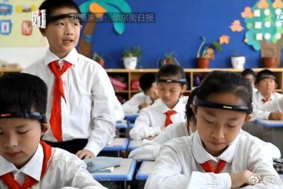 Chinese primary school stops using headbands to study pupils’ concentration levels after public outcry