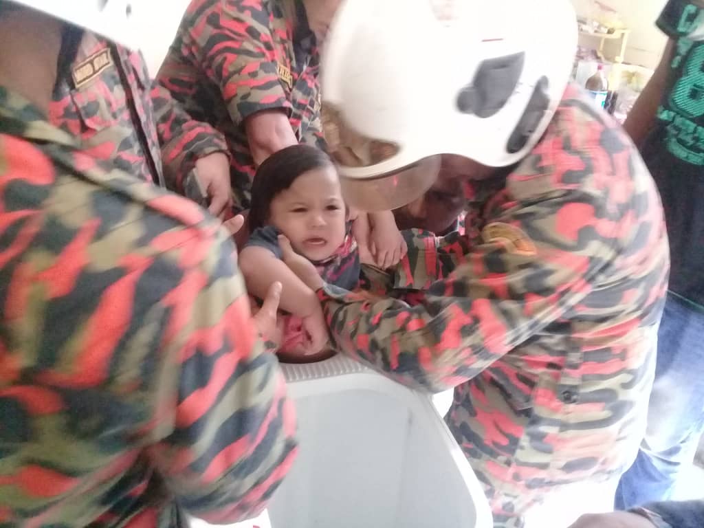 Toddler stuck in washing machine for 30 minutes