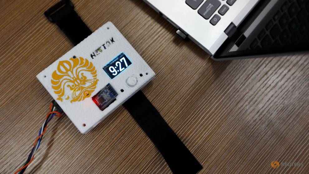 Put down that phone! Indonesians invent device to aid internet-addicted