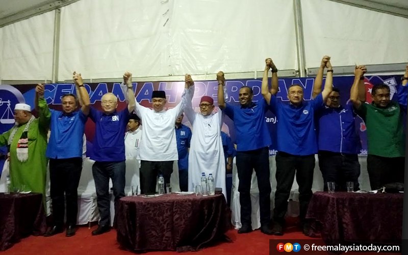 ‘Chop off hands’ of those out to break Umno-PAS unity, says Hadi