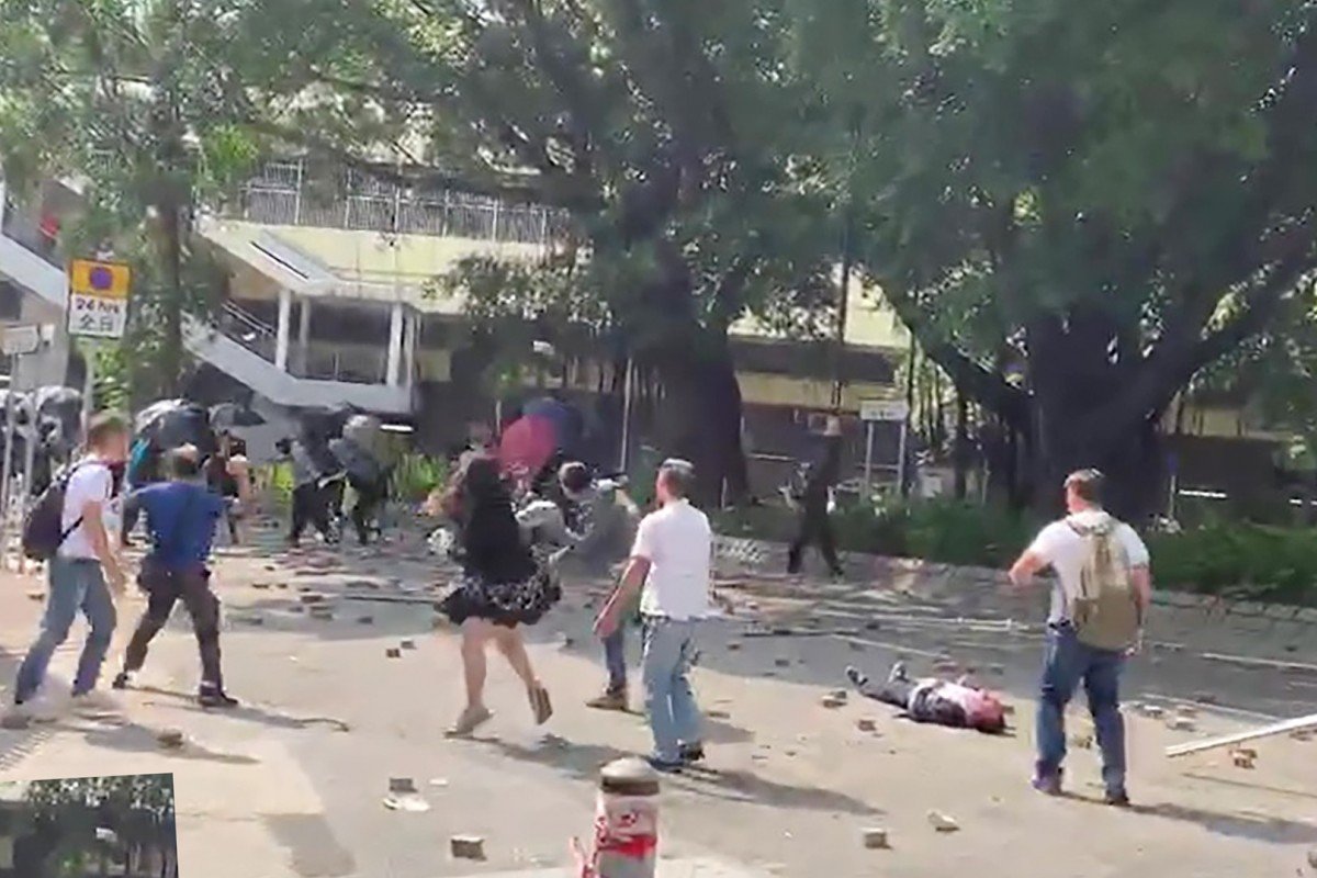 Man, 70, hit on head by brick during Hong Kong clash dies