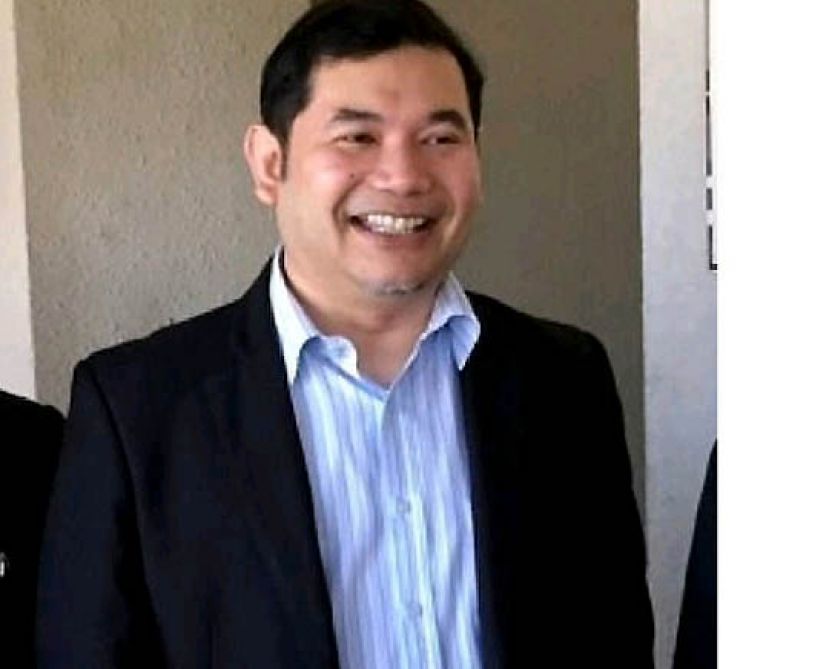 拉菲兹上诉得直 养牛公司泄密案判无罪