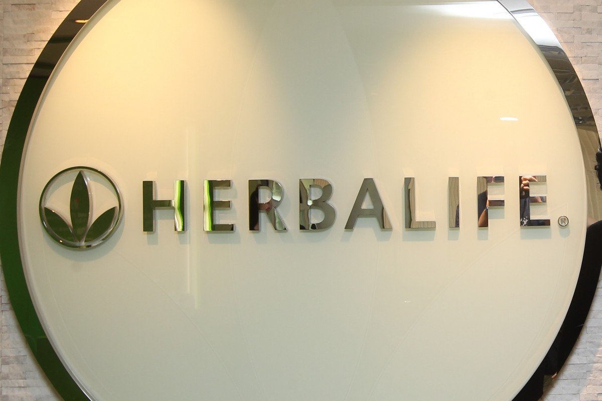 Ex-Herbalife executives Li Yanliang and Yang Hongwei charged in US with bribing Chinese officials