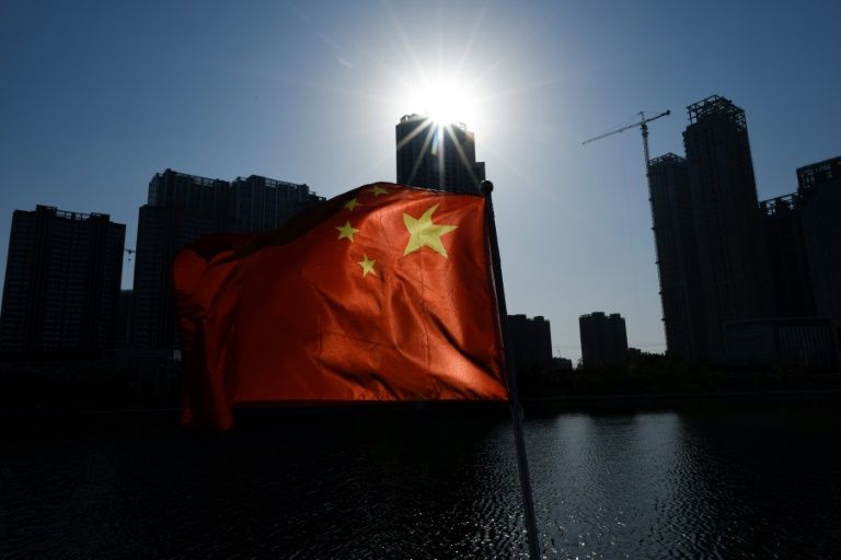 China urges students to be 'cautious' in Australia as row escalates