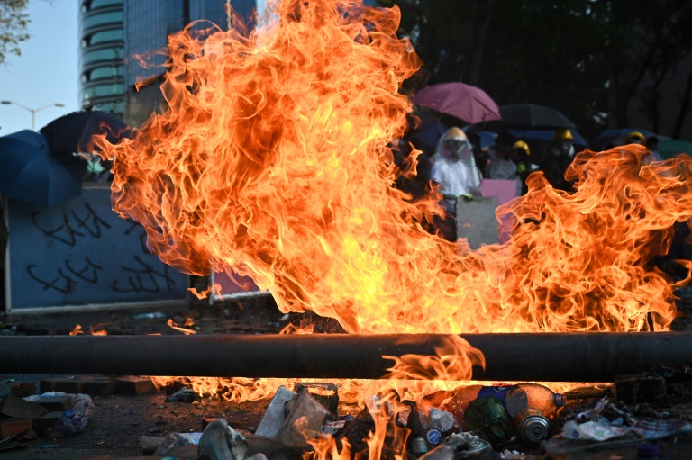 Fire holds off Hong Kong police at protest campus
