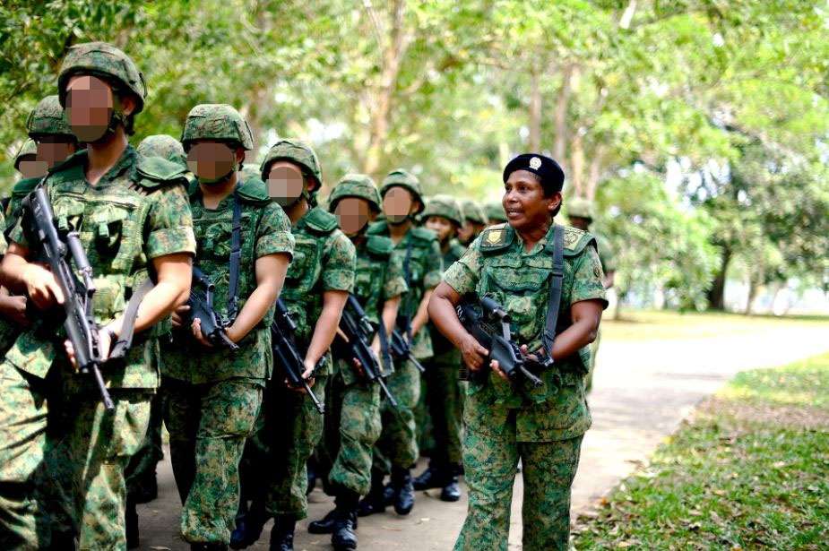 This 61-year-old female SAF ‘encik’ leads route marches, digs shell scrapes & gets ippt gold every year