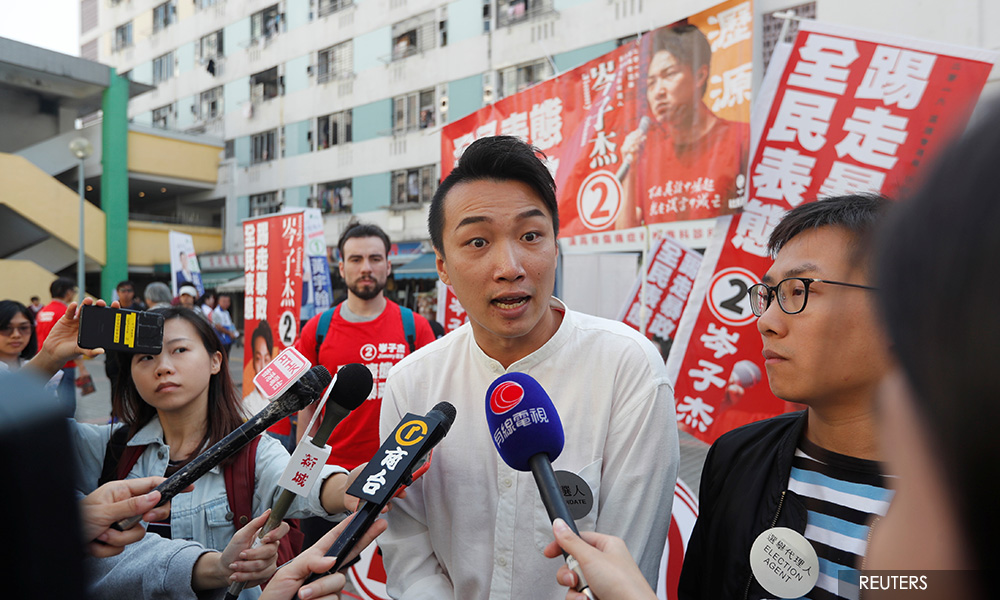 Hong Kong democrats cheer landslide victory in local elections