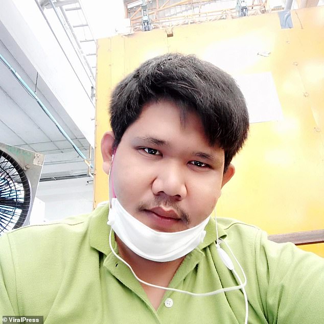 Man, 28, is electrocuted by his phone while playing with it as it's plugged into a charger at his home in Thailand
