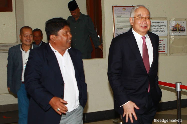 Najib schools 'office boy' Husni, says his former deputy intent on tarnishing him