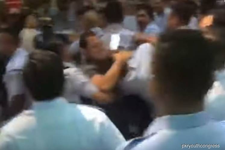Cops detain two to help investigation into chaos at PKR Youth Congress