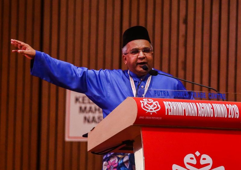 Umno delegate makes veiled claims that DAP sold IC to Chinese nationals