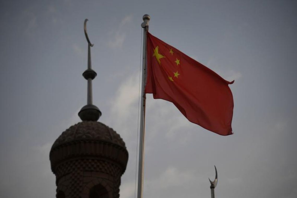 Chinese officials lash out at US over new legislation on Hong Kong, Xinjiang