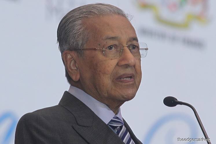 Dr Mahathir hands over letter of appointment to new chief secretary to govt