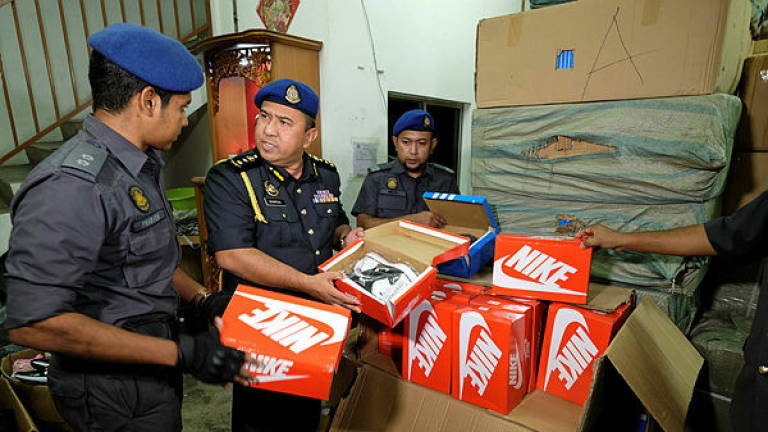 KPDNHEP Putrajaya seizes fake branded footwear worth RM1.3m