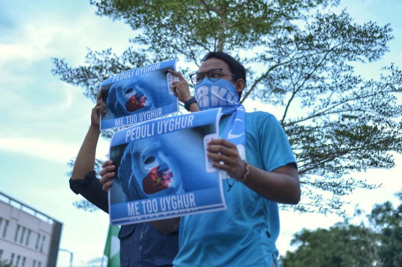 At Chinese embassy’s Xinjiang show, Muslim groups, PAS protest in support of Uighurs