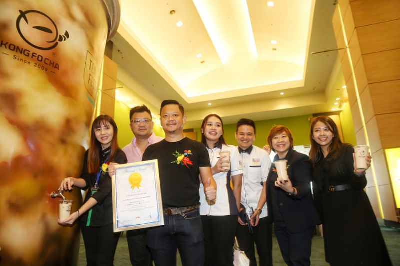 Towering 3.7m boba model cup dispenses milk tea for thirsty guests at KL exhibition