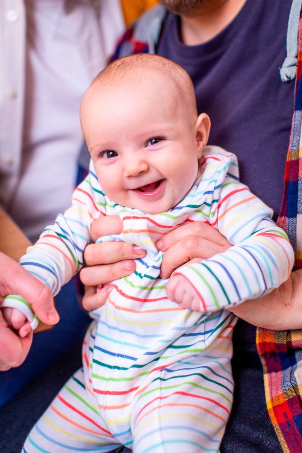 Transgender man gives birth to non-binary partner's baby with female sperm donor