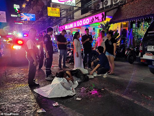 British man, 50, is killed on the stroke of midnight in front of his fiancee as firework he was trying to light explodes in his face amid New Year celebrations in Thailand
