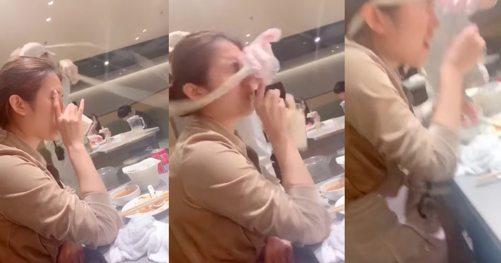 Tea-sipping lady smacked in the face during Hai Di Lao noodle dance