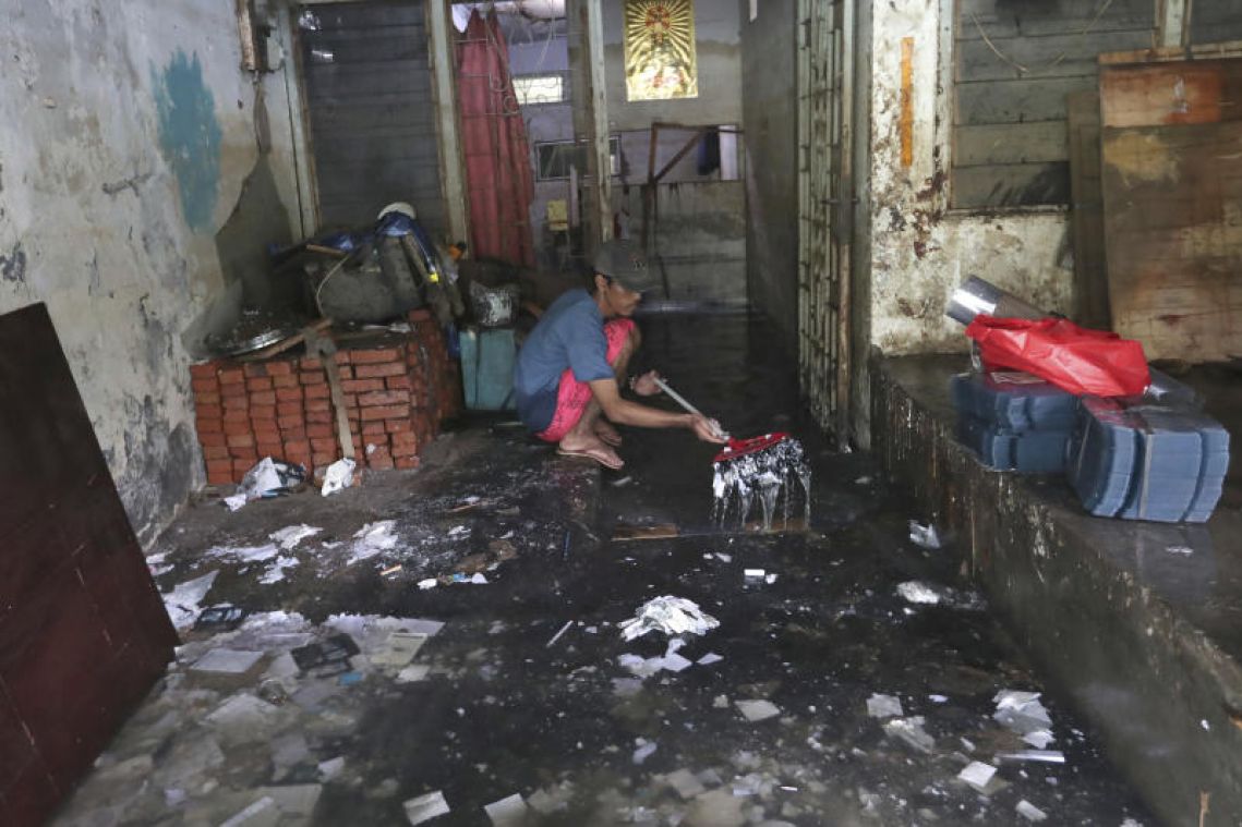 Indonesia's flooded capital disinfected to fend off disease