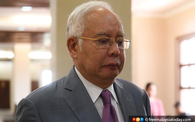 Najib says he doesn’t know who forged signature