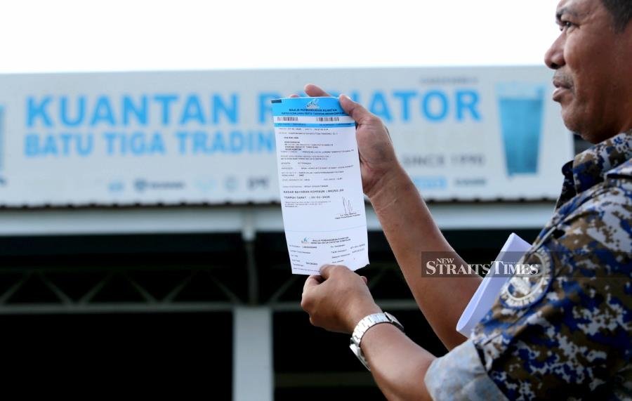 Jawi signage in Pahang: Stickers allowed, for now