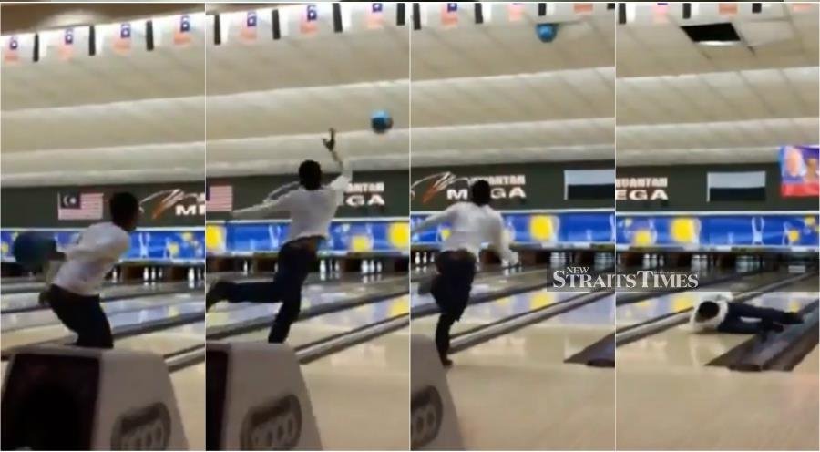 Watch: Amateur bowler launches ball into ceiling of Kuantan bowling alley
