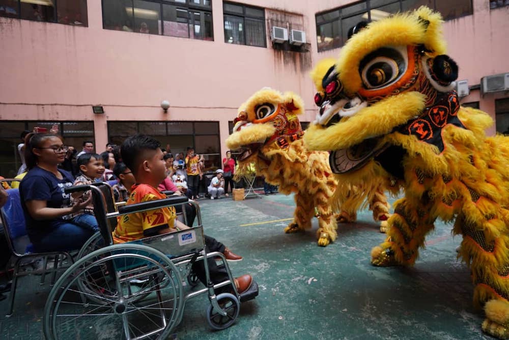 Meeting lion head maker a CNY dream come true for Sabah teen with muscular dystrophy