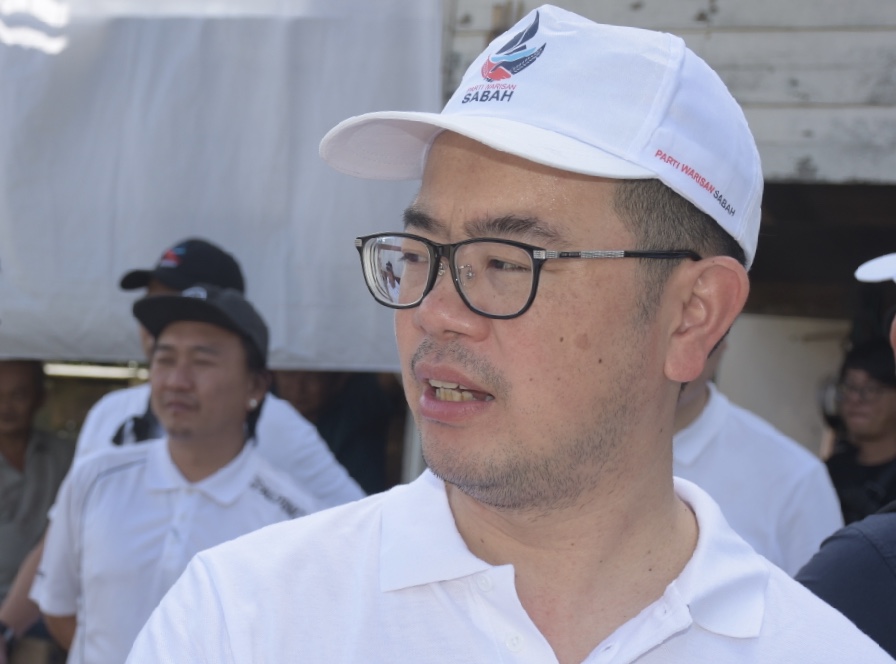 Junz dares PBS, Umno to deny ‘Pas Residen Sabah’ was approved by BN in July 2015