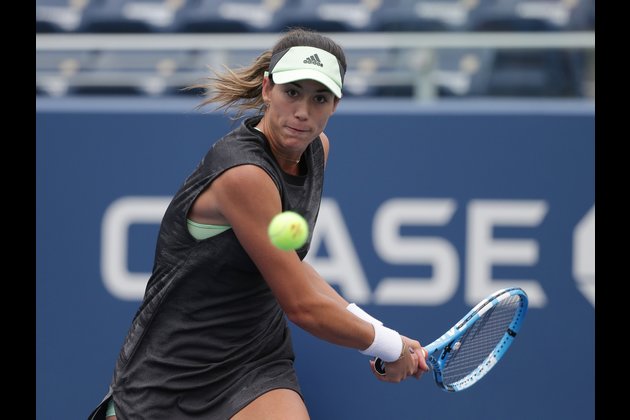 No. 11 seed Muguruza survives three-set test in Doha opener