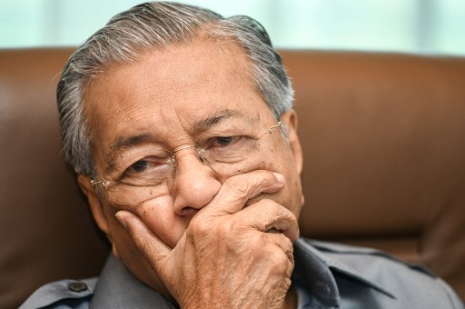 Dr Mahathir juggles between liberals, fanatics, dropping the ball too often
