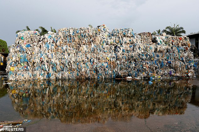 The world is using more than 100 billion tonnes of natural resources per year for the first time, while global recycling has FALLEN