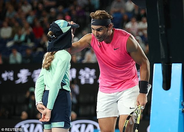 Heartwarming moment Rafael Nadal meets ball girl Anita, 13, to say sorry for hitting a forehand into her face - as jealous fans say they wish THEY were struck