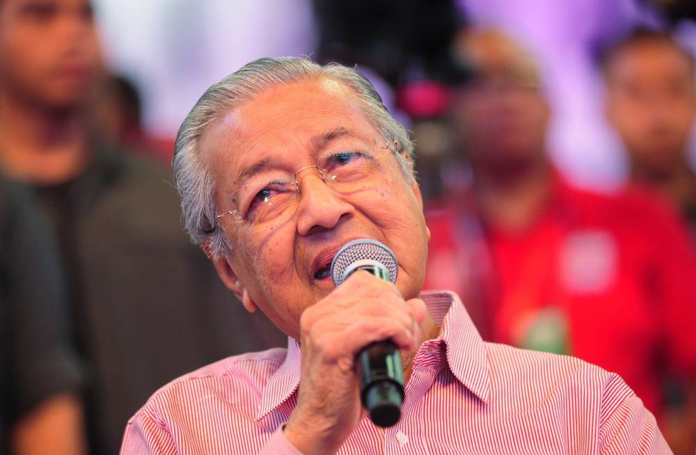 Dr M urges more rural people to venture into business