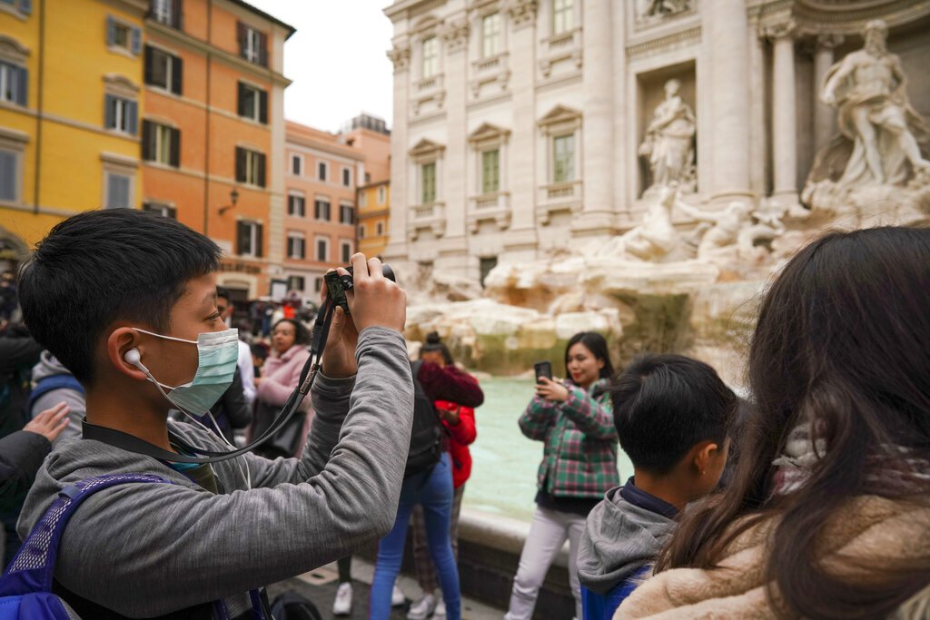 Italy towns under lockdown as first European coronavirus death reported