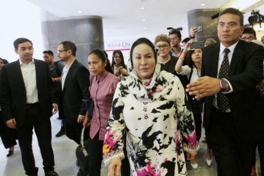Najib's wife Rosmah says taken ill, her graft trial adjourned to Wednesday