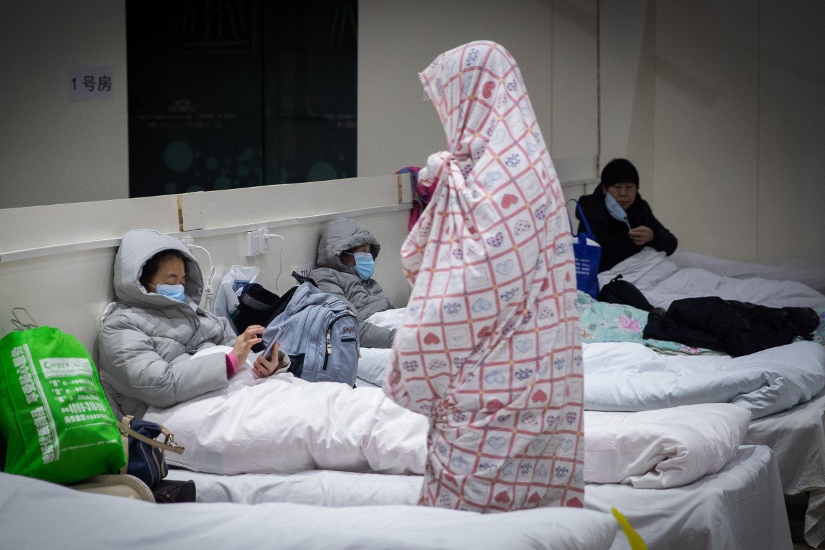 Desperate patients struggle to get help in coronavirus-hit Wuhan as others wait it out