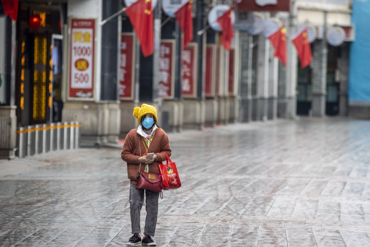Megacities put up coronavirus entry barriers as China goes back to work