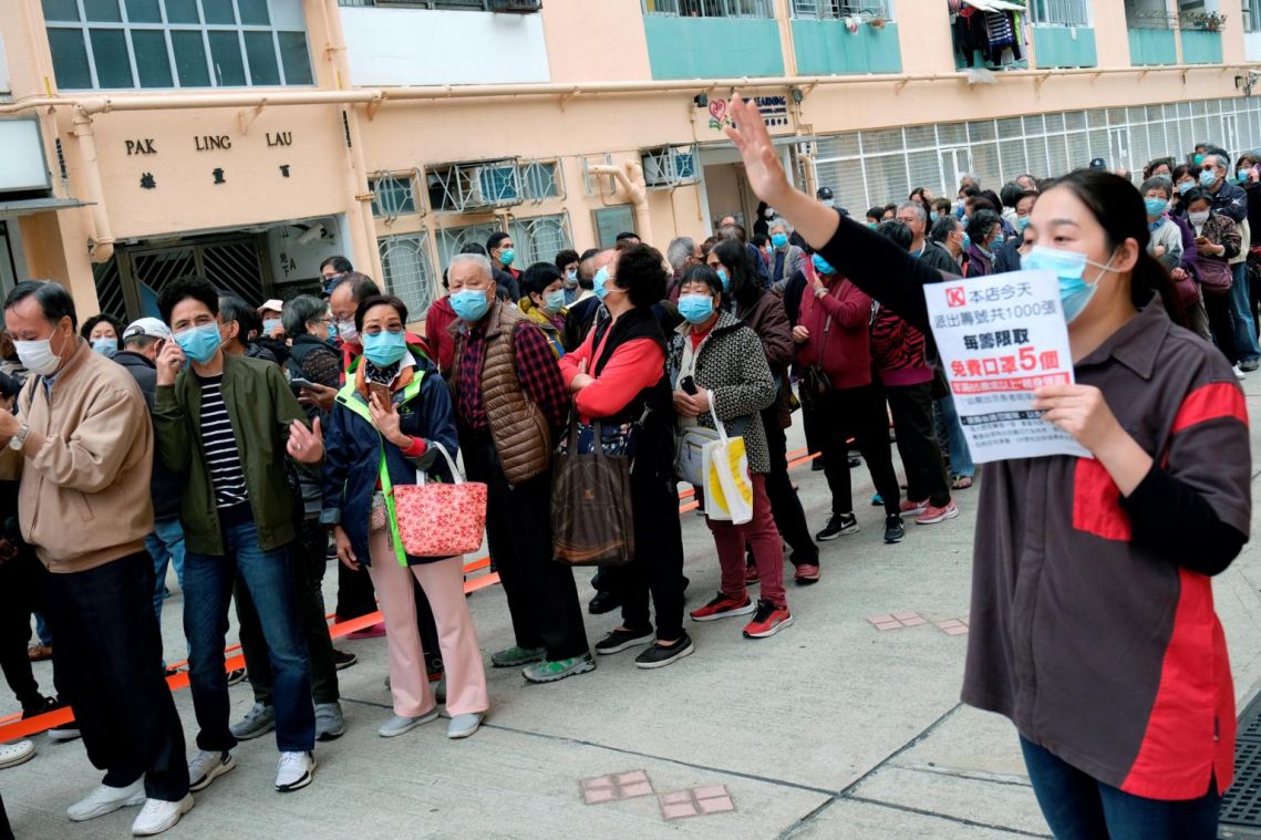 In Hong Kong, the coronavirus strikes a wounded city