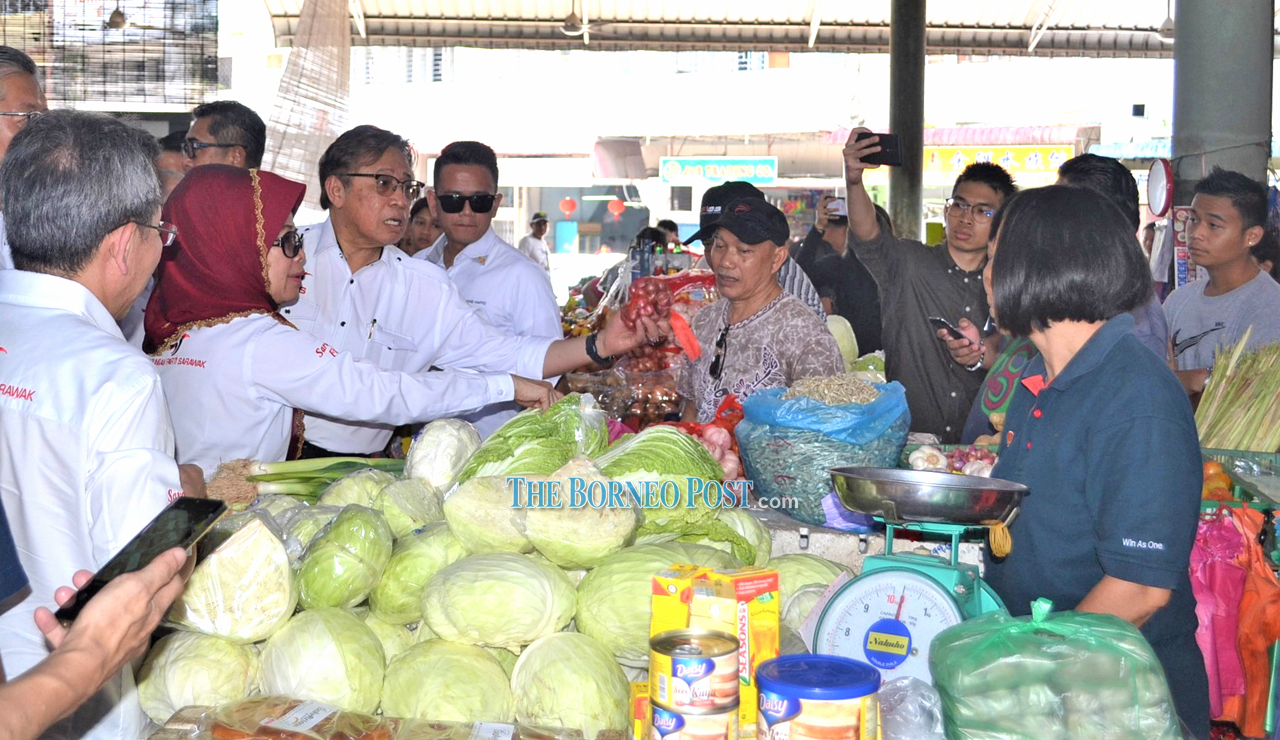 CM visits Sibu Central Market, interacts with townsfolk