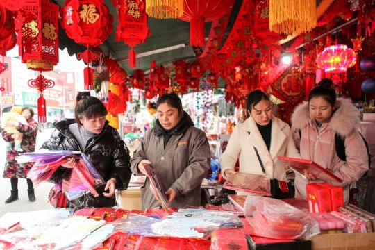 China charges man who wanted banquet despite gathering ban