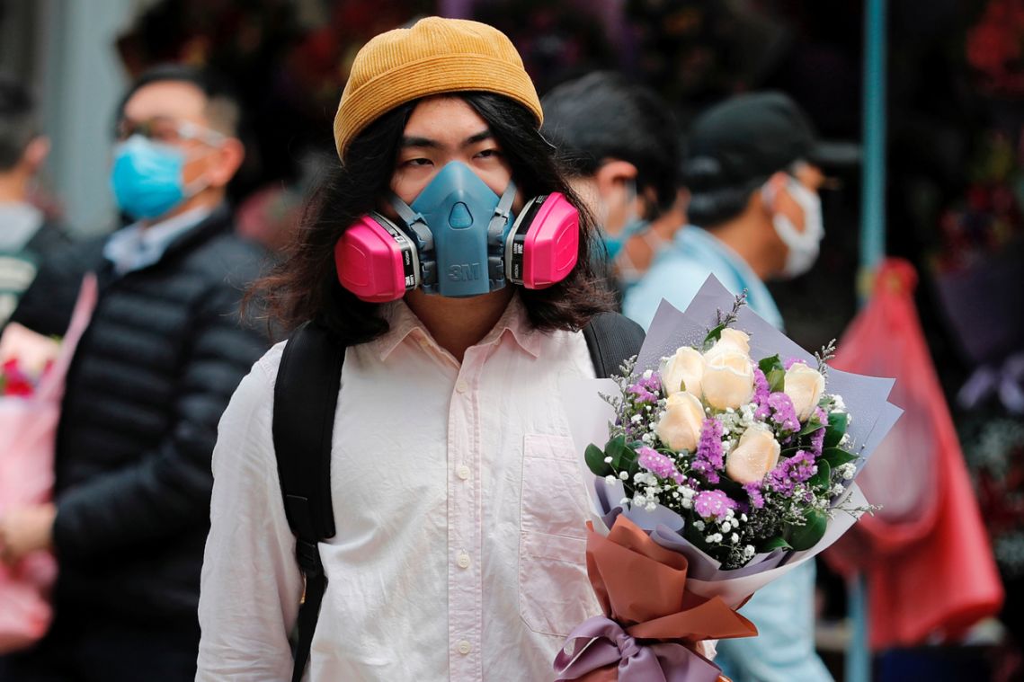 Virus-hit Hong Kong says it with face masks, not flowers