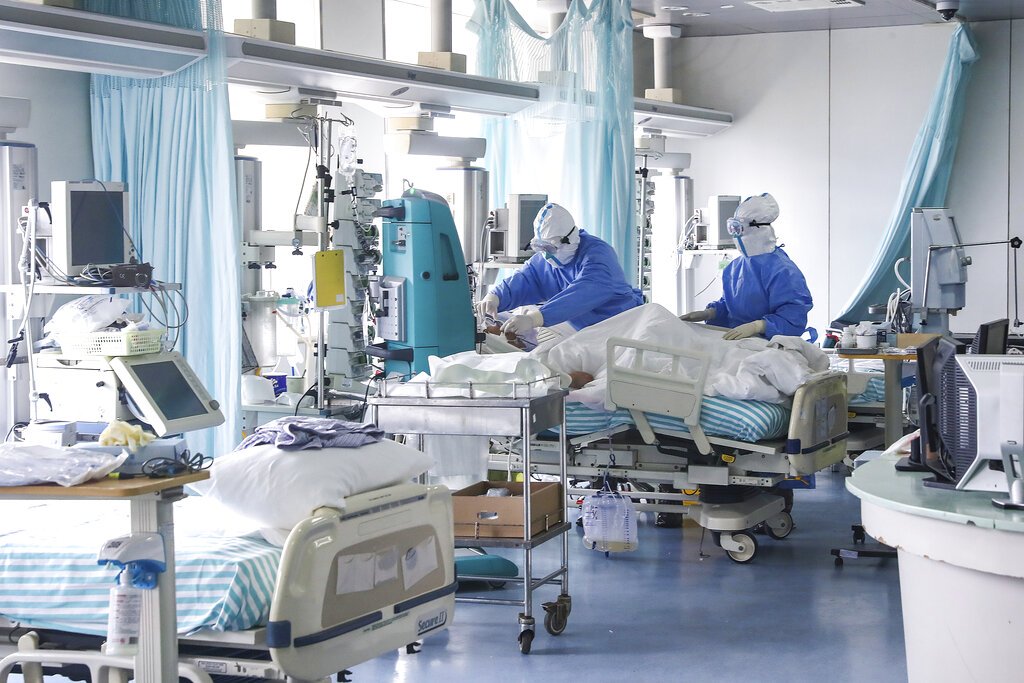 China reports 44 new virus deaths, lowest rise in cases over a month
