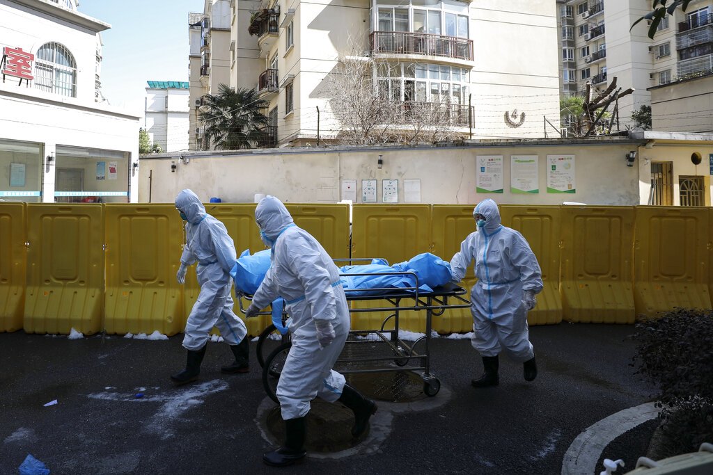 China reports 28 virus deaths, rise in new cases outside epicentre