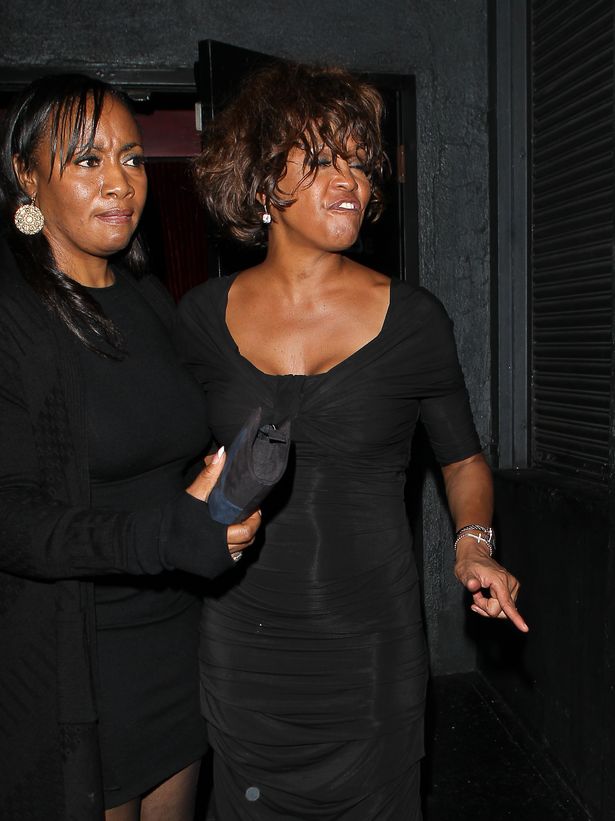 Whitney Houston's distressing autopsy report - sewn on wig and 11 teeth 'lost to crack'