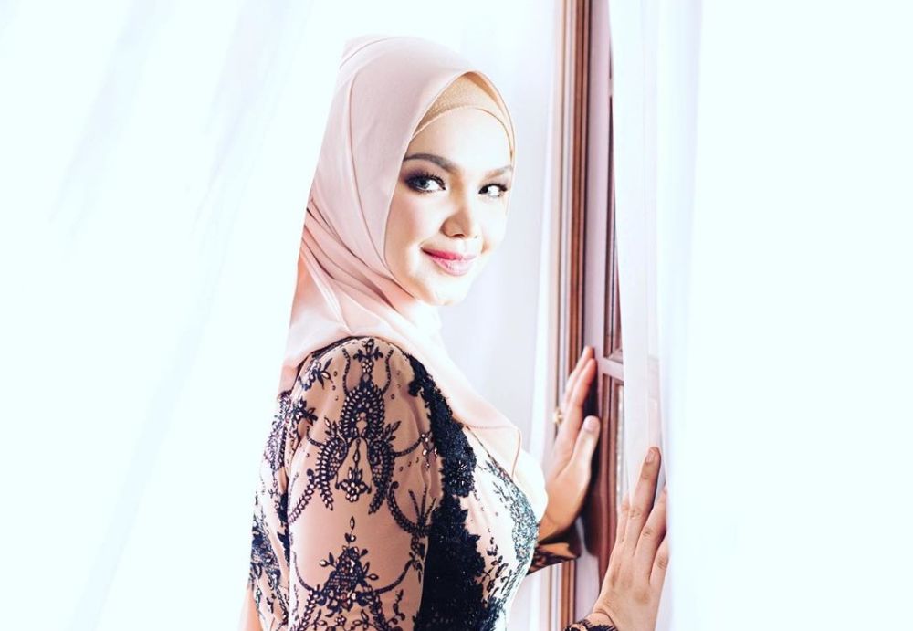 Siti Nurhaliza urges public to remove her latest single from YouTube (VIDEO)