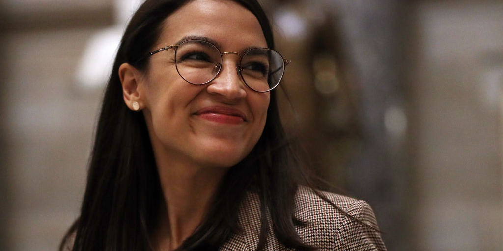 Alexandra Ocasio-Cortez clapped back at criticism for wearing a designer dress on TV: ‘I rent, borrow, and thrift my clothes’
