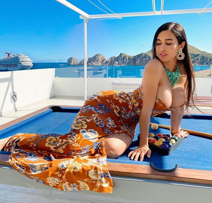 Joselyn Cano flaunts enormous cleavage in mustard floral gown on Instagram photo
