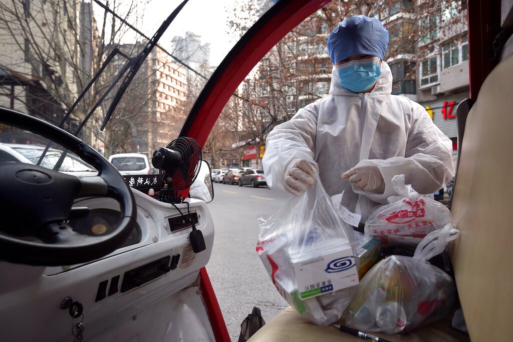 China slightly eases Wuhan’s virus quarantine measures